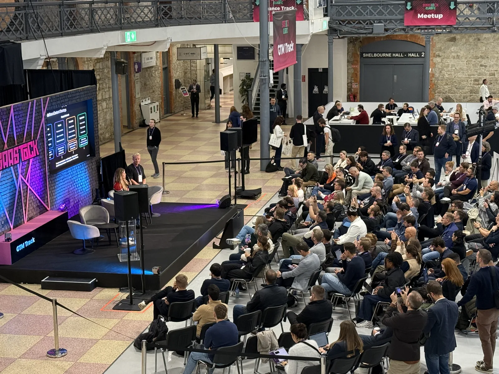 Founders seated shoulder to shoulder for a keynote in Dublin